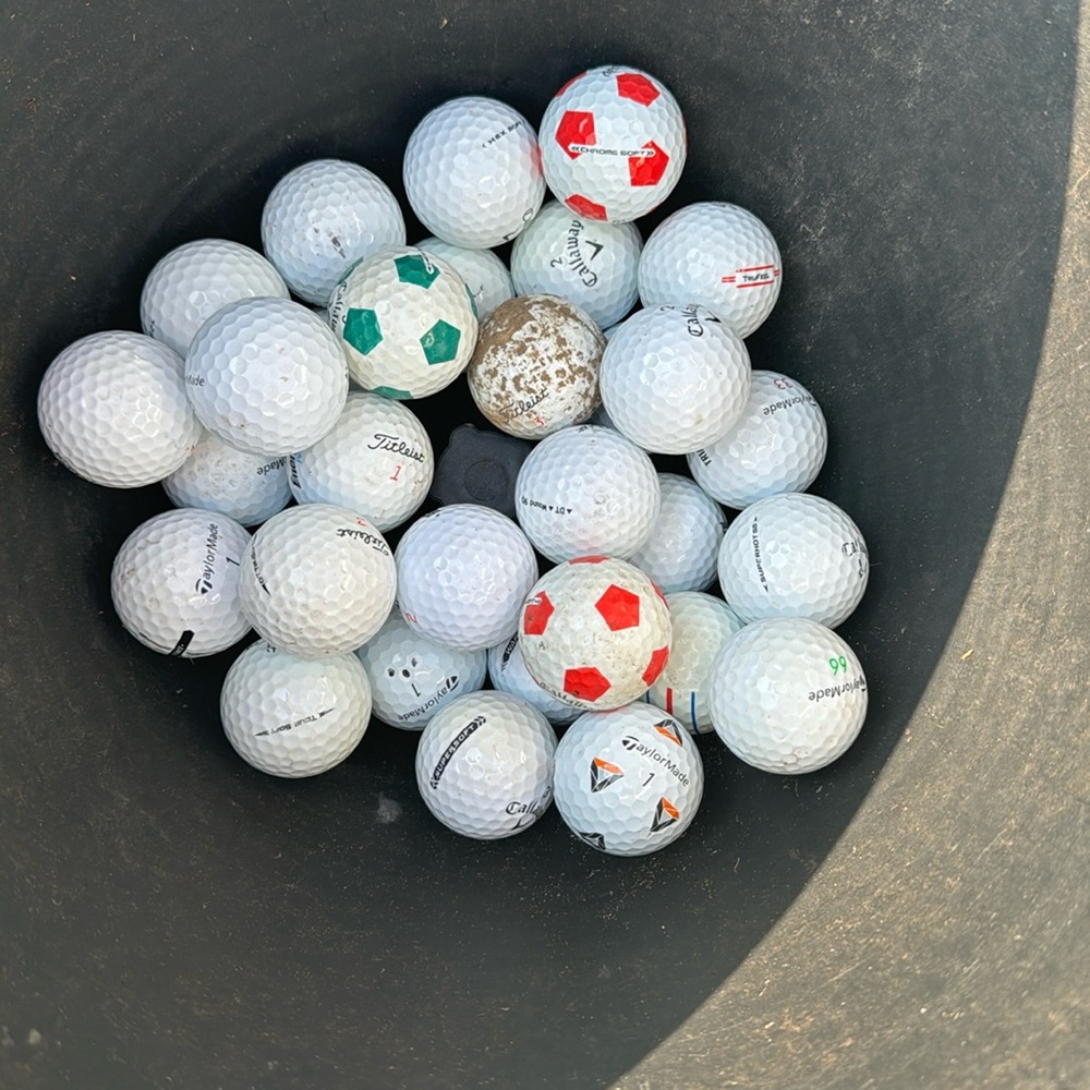 Nice golf balls, Titleist Callaway, Tayler made